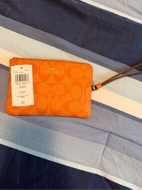 Coach Orange Signature Zip Wristlet with Gold Logo